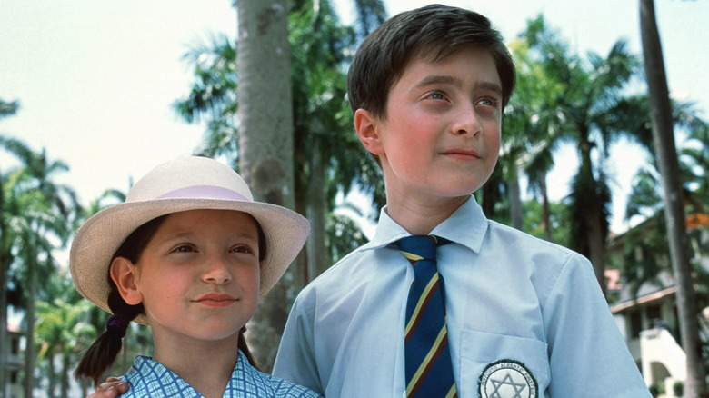 Daniel Radcliffe in his debut role as Mark Pendel, alongside Lola Boorman as Sarah Pendel, in The Tailor of Panama